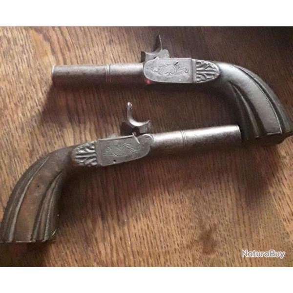 2 pistolets poudre noir