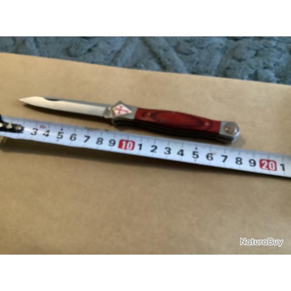 Petit couteau pliant pour sac de femme fait en Espagne avec la croix de la chretiente