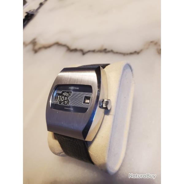 Montre � guichet Mirexal ( Suisse ) Automatique calibre Camy 25 jewels Swiss fonctionne parfaitement