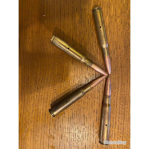 Lot quatre cartouches 12.7x99mm Inerte.