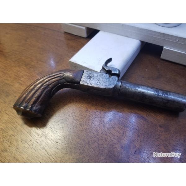 pistolet coup de poing ancien