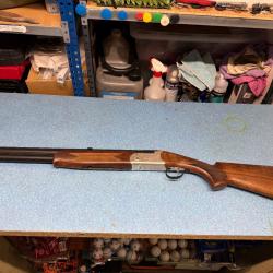 Fusil superpos&eacute; Suhlberg sous bois avec shock