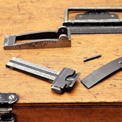 Lot Pi&egrave;ces d&eacute;tach&eacute;es Hausse pour fusil Suisse Schmidt Rubin G11