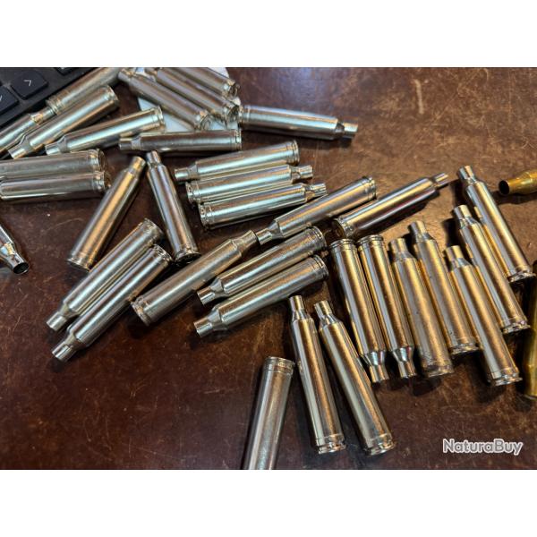 lot de 92 douilles amorc�es jamais tir�es calibre 7 RM mise a prix a 1.00� sans prix de r�serve