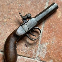 Pistolet de coffre &agrave; percussion