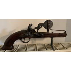 Pistolet testeur de poudre &agrave; silex