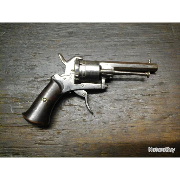 R�volver a broches.