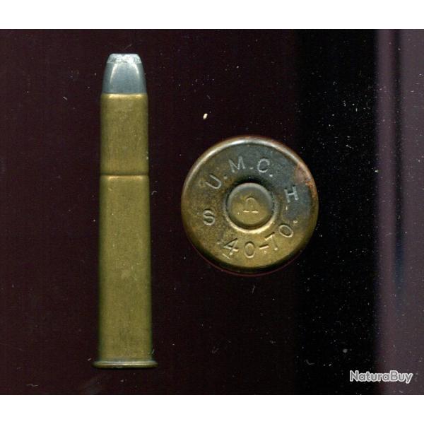 .40-70 WCF - marquage : UMC S H  40-70 - balle cuivre �tam� pointe plomb plate - �tui laiton 61 mm