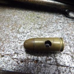 11.43 colt 45 Thompson FR 1954 indochine perc&eacute;e part en part / tour de cou neutralis&eacute;e 45acp Alg&eacute;rie