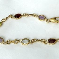 Tr&egrave;s joli bracelet estival or 18 carats et pierres - 20 cm