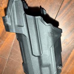 Holster gaucher blackhawk t-series pour sig p320 avec viseur point rouge et lampe streamlight TLR-1