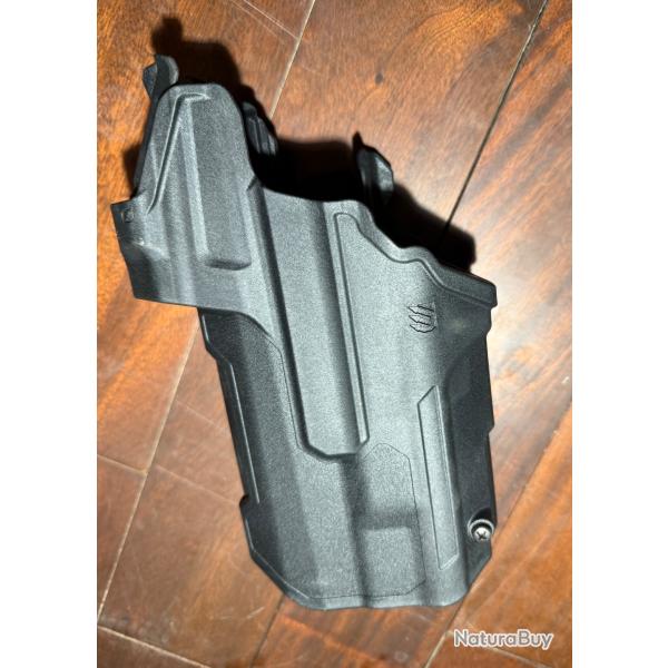 Holster gaucher blackhawk t-series pour sig p320 avec viseur point rouge et lampe streamlight TLR-1