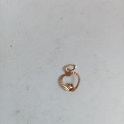 pendentif en 18k avec rubis 0,32 gr