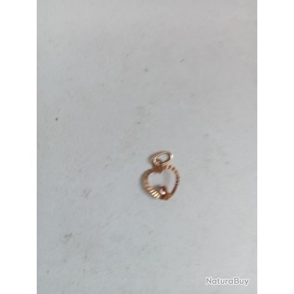 pendentif en 18k avec rubis 0,32 gr