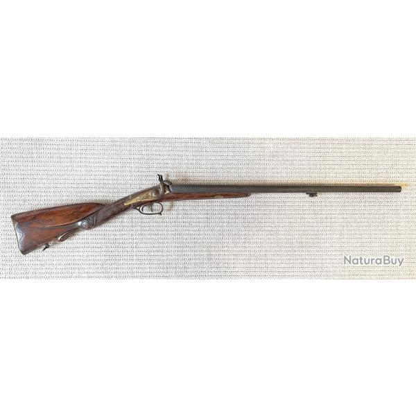 Fusil de chasse ancien � canons juxtapos�s avec crosse sculpt�e pour collection