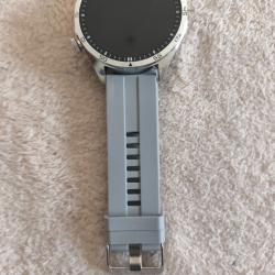 Montre connect&eacute;e gps Xiaomi gt4 pro , bracelet gris et marron.