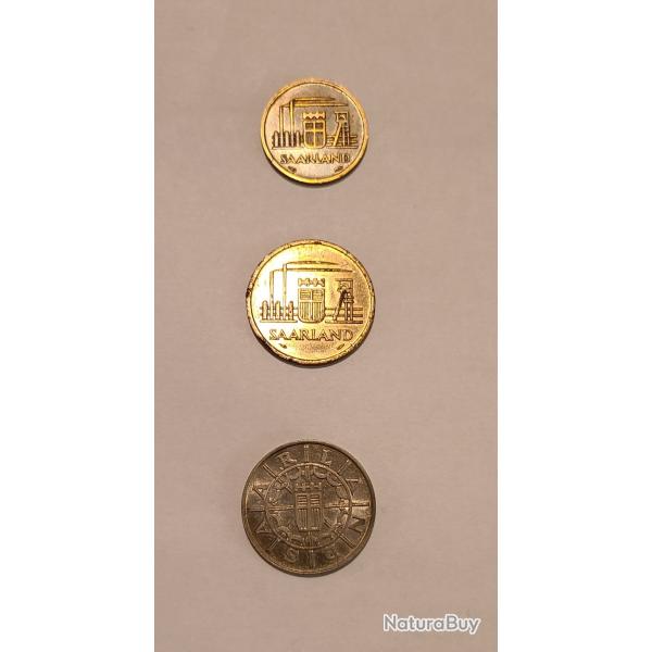 Trois monnaies de la Sarre.
