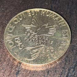 France - m&eacute;daille comm&eacute;morative - 1995 - 50 ans du Secours populaire - bronze OCCASION .