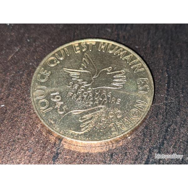 France - m�daille comm�morative - 1995 - 50 ans du Secours populaire - bronze OCCASION .