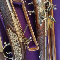 Exceptionnelle paire de pistolets &agrave; silex Zanotti florentin de tr&egrave;s grand luxe en coffret am&eacute;nag&eacute;