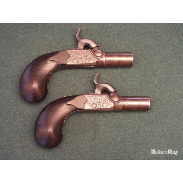 Paire de pistolet � percussion crosse en �b�ne (A588)