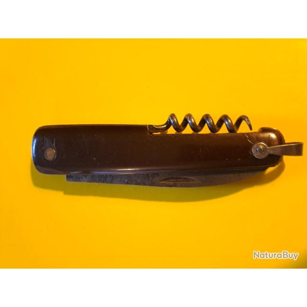 Ancien couteau bouledogue, manche bak�lite bordeaux, lame oxyd�e, ressort OK