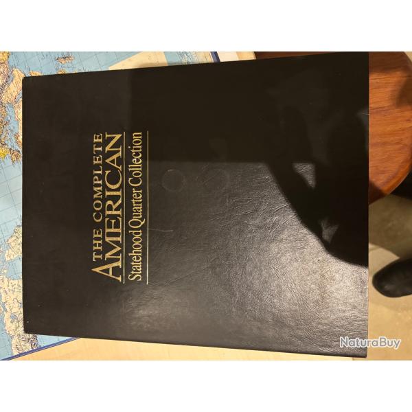 Pi�ces de monnaies de collection des �tats unis l'ensemble avec le support de classement .