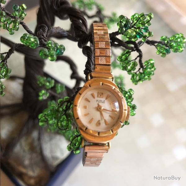 Montre en OR  - 18k    marque Kipl�  comme neuve