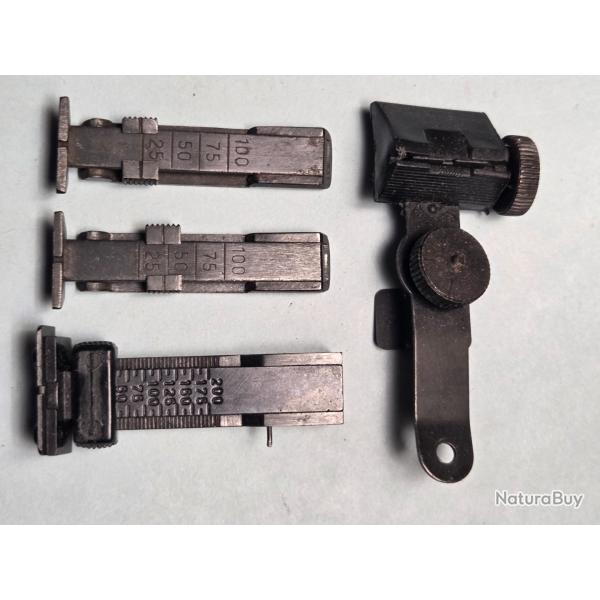 Un lot de quatre hausses de carabine divers