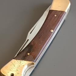 ANCIEN COUTEAU PUMA en 2 pi&egrave;ces, manche palissandre, fermeture &agrave; pompe.