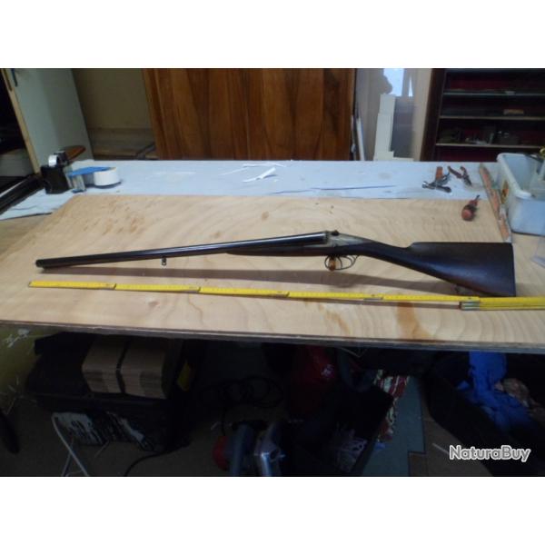 Tr�s rare fusil de chasse calibre 12 canons fixes de marque PEUGEOT