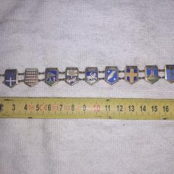 Bracelet souvenirs Blasons Juan les pins, Monaco, St Raphael, Menton, Sospel, Cannes
