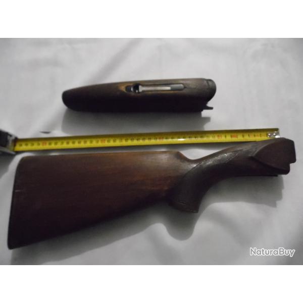 CROSSE DE FUSIL CALIBRE 12 AVEC SA LONGUESSE SORTIE DE GRENIER