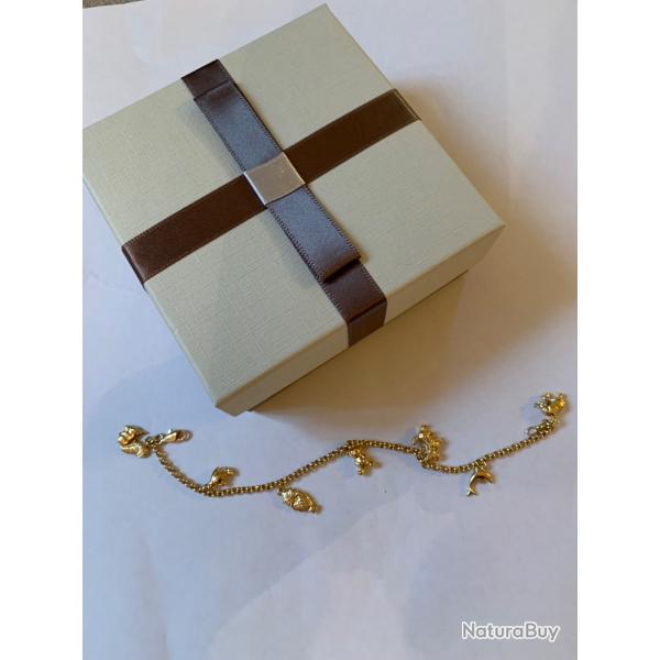 Bracelet � breloques or jaune 18 carats 750/1000 en excellent �tat
