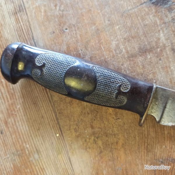 Dague de chasse ou de v�nerie, poign�e bak�lite, lame en acier, en �tui cuir