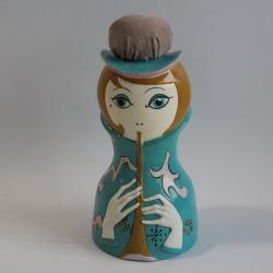 Tirelire figurative Pique-aiguilles Femme jouant fl&ucirc;te