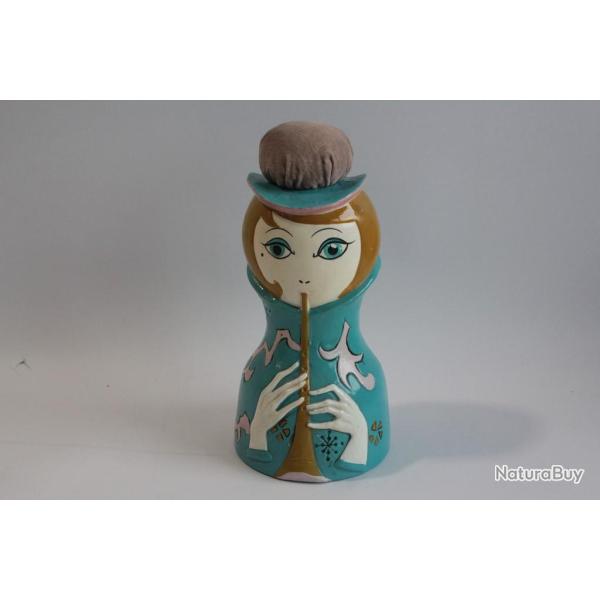 Tirelire figurative Pique-aiguilles Femme jouant fl�te
