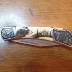 Petit pliant, manche en Elforyn et scrimshow.