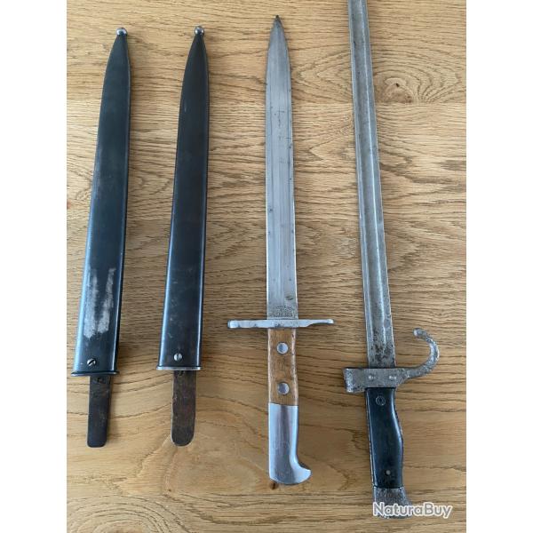 Ba�onnette suisse avec deux fourreaux en bonne �tat, une autre plus longue sabl� mais � restaurer