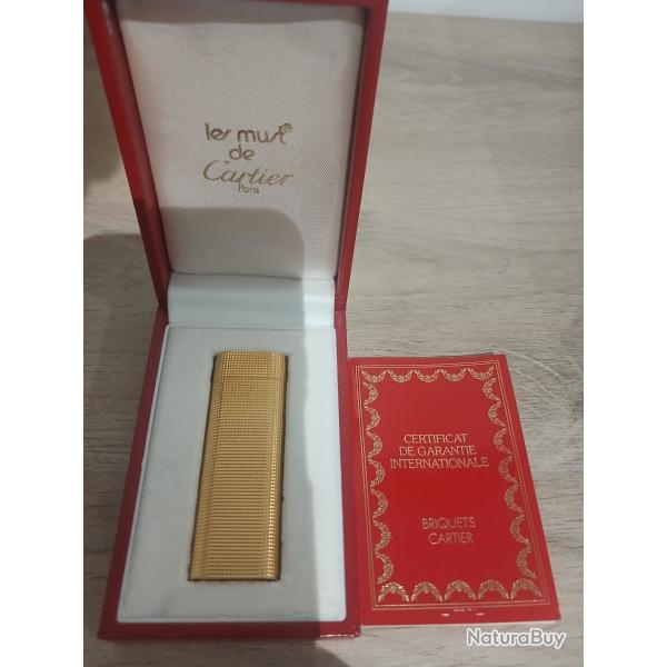 Tr�s beau briquet cartier plaqu� or boite ,certificat
