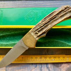 Ancien couteau PUMA SOLINGEN / 4 STARS (1985) / BOIS DE CERF / NEUF + BOITE