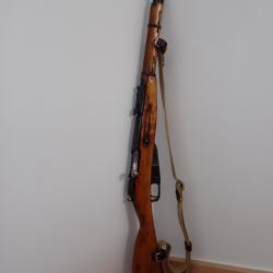 Tr&egrave;s rare Mosin Nagant 91/59 produit &agrave; moins de 50000 exemplaires. Sorti d'arsenal, &eacute;tat superbe.
