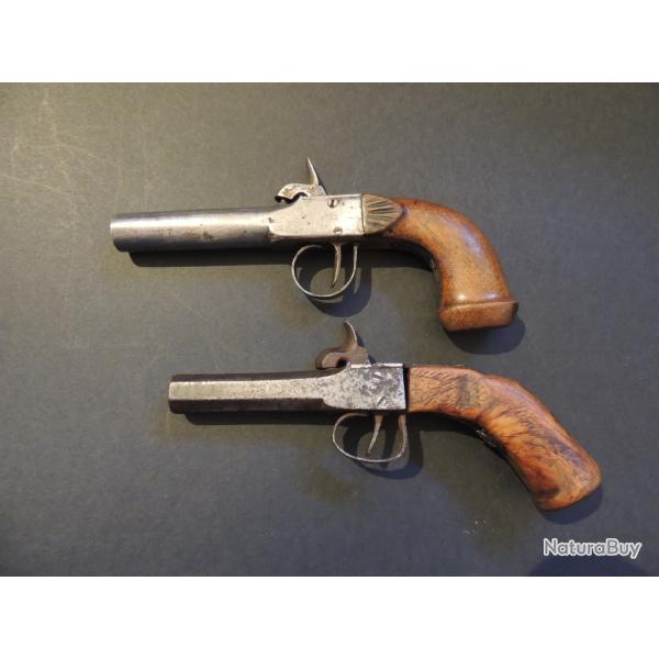 Lot de 2 pistolets � poudre noire monocoup