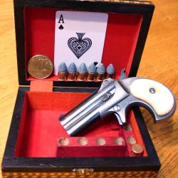 MAGNIFIQUE COFFRET D'OCCASION (TB.ETAT) POUR UN BEAU DERRINGER + UNE RAMPE CAL. 41 RIMFIRE A 9 TROUS