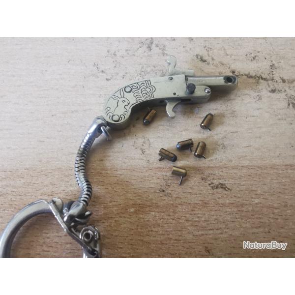 Pistolet Berloque calibre 2mm � broche syst�me LEFAUCHEUX.