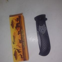 Couteau pliant l&eacute;opard wild grip noir tr&egrave;s bonne prise en main