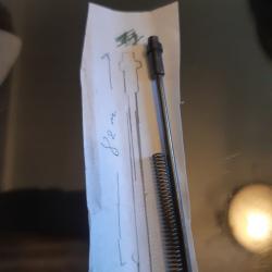 Percuteur avec ressort