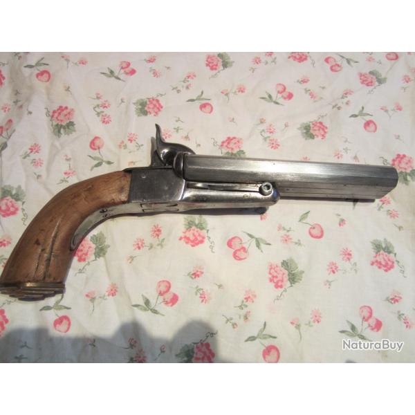 Pistolet de v�nerie � broche et deux canons.