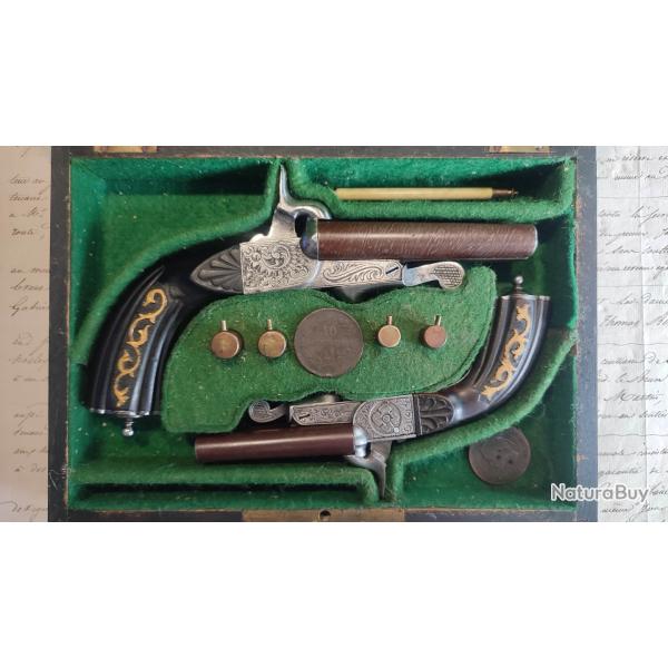 Magnifique paire de pistolets juxtapos�s de luxe 12mm et 9mm � broche sign� BOISSY XIXe en coffret