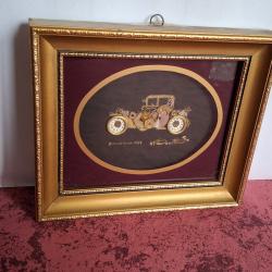 Tableau Ken Broadbent r&eacute;alis&eacute; avec des pi&egrave;ces d'horlogerie